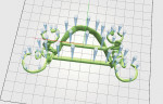 Figure 5  Sprues are placed through-out the mandibular virtual framework preparing for additive perfactory pattern printing.