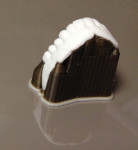 Figure 2. An example of a FDM 3D printed prototype of an upper denture on a removable support material.