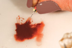 Figure 5. The author recommends using an endodonic file to apply the stain.