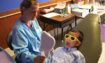 Tufts University School of Dental Medicine works to educate under-insured children about their dental health.
