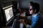 Fig 2. A technician uses 3M’s Margin Marking
Software, with 3D glasses to enhance the view.