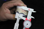 Figure 12  The high lip line measurement is transferred from the papillameter to the caliper.