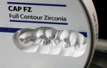 Figure 7  The milled green-state zirconia in a CAP FZ disc.