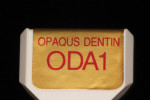 The opacious dentin build-up should comprise a larger volume than fired porcelain as it helps to create a more dense gingival and body shade.