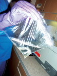 Figure 9. Zippered plastic bags are convenient for ultrasonic cleaning of prostheses.