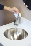 Figure 8 A disposable towel should be used to turn off manual faucets.