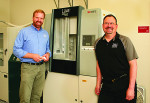 CAD/CAM Manager Jed Miller, left, and Crown and Bridge Manager Steve Daggett of D&S Dental Laboratory in Waunakee, Wisconsin.