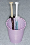 Figure 2  Cup with chlorhexidine and light-cured calcium hydroxide preloaded and ready for immediate use.