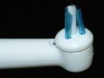 Fig 1. The Power Tip brush head provides a cone-shaped bristle design, which permits good interproximal access. In addition, this brush design provides adequate access between overdenture bars or fixed implant frameworks and associated soft tissues, as well as around transmucosal implant components.