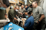 Figure 2  HELMAND, PROVINCE, Afghanistan —U.S. Navy Lt. Sarita Ojha, a dentist with 1st Dental Detachment, Charlie Surgical Company, Combat Logistics Regiment 15 (Forward), 1st Marine Logistics Group (Forward), performs a root canal on a military w